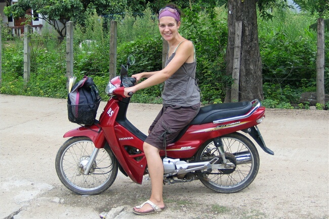 Cheryl riding the bike they shared in Pai